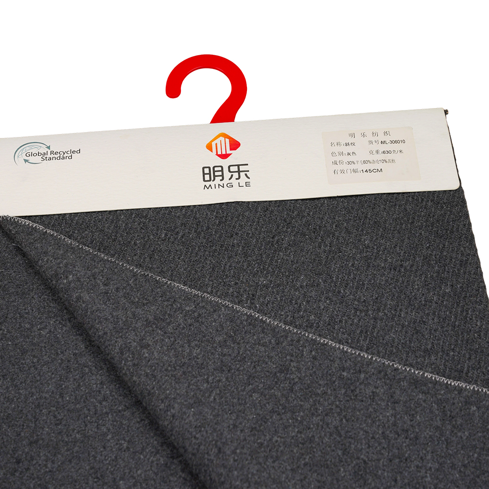 Hoe verhoudt Twill Wool Melton-stof zich tot gewone wol en andere stoffen?