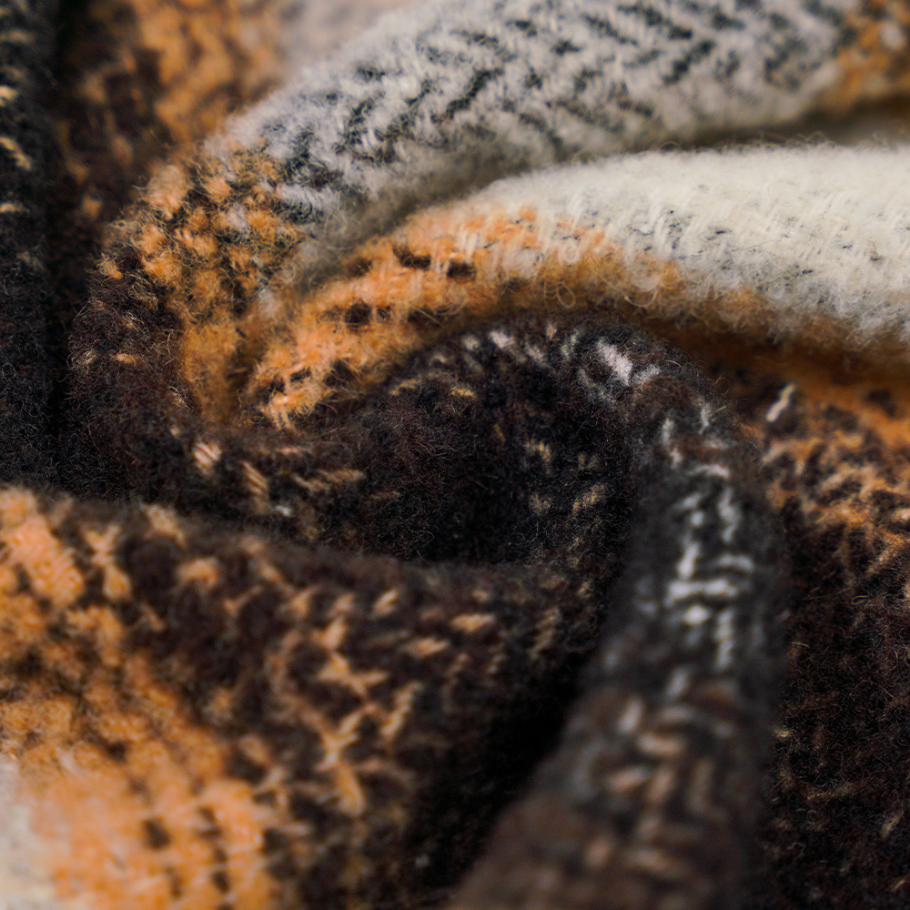 40% wol, 60% polyester, 540 g/ml, zwart en wit, cirkeltweedstof, ML-8021071